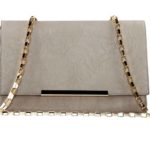 Sukienki wizytowe kolekcja Solar na sezon wiosna/lato 2014. Biel pozostaje na ważnym planie