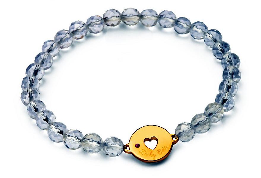 Naszyjniki i bransoletki z grawerem, małe talizmany